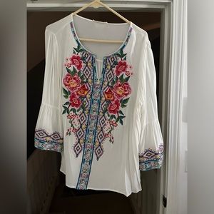 Cute white blouse with crochet flowers